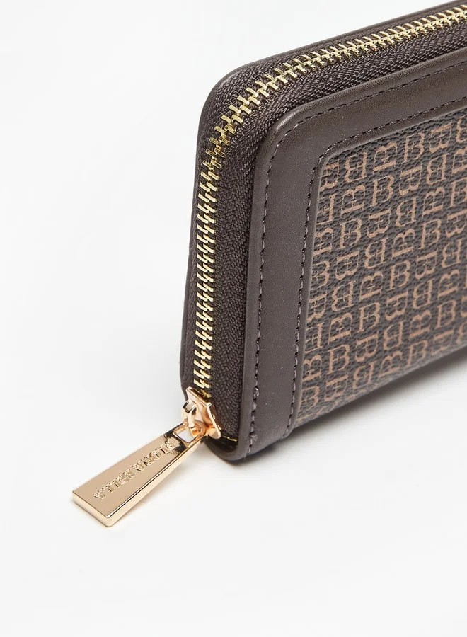 فلورا بيلا من شو إكسبرس All-Over Logo Print Zip Around Wallet
