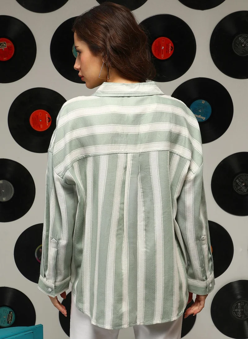 Campus Sutra Women's Sage Green Halo-Striped Oversized Shirt For Casual Wear | Spread Collar | Long Sleeves | Button Closure | Oversized Shirt Crafted With Comfort Fit For Everyday Wear