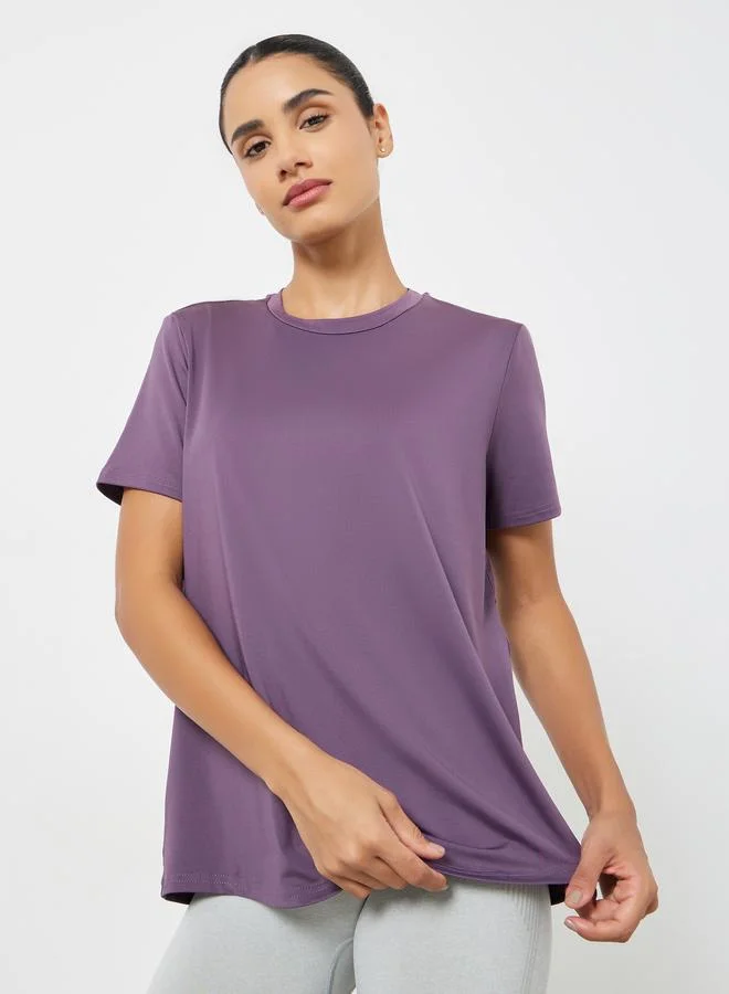 ستايلي اكتيف بلوزة بتفاصيل خياطة وشبك خلفي