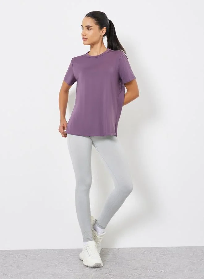 ستايلي اكتيف بلوزة بتفاصيل خياطة وشبك خلفي