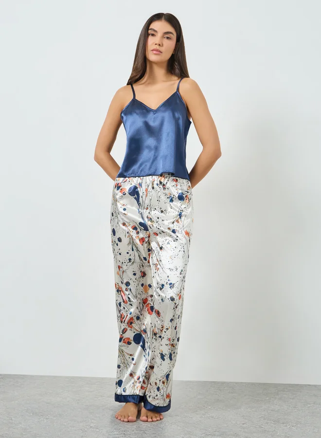 تايك تو طقم بيجاما من بنطال مطبع وبلوزة كامي