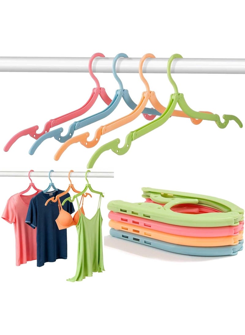 شماعات ملابس قابلة للطي، عبوة من 4 شماعات ملابس محمولة، منشر ملابس بلاستيكي قابل للطي سحري مع سطح غير قابل للانزلاق بأربعة ألوان لتجفيف الملابس أثناء السفر والمنزل - Image 1