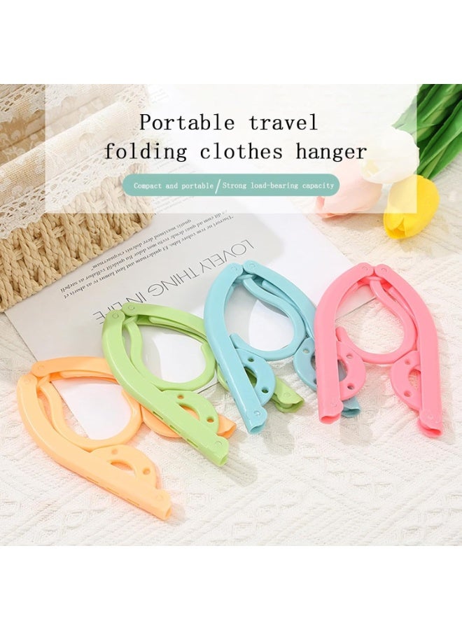 شماعات ملابس قابلة للطي، عبوة من 4 شماعات ملابس محمولة، منشر ملابس بلاستيكي قابل للطي سحري مع سطح غير قابل للانزلاق بأربعة ألوان لتجفيف الملابس أثناء السفر والمنزل - Image 2