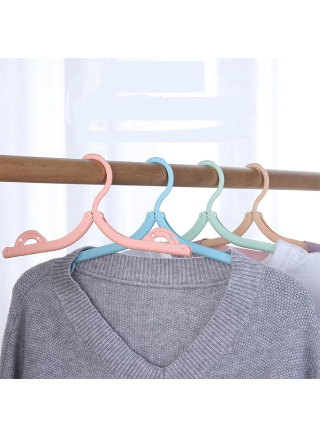 شماعات ملابس قابلة للطي، عبوة من 4 شماعات ملابس محمولة، منشر ملابس بلاستيكي قابل للطي سحري مع سطح غير قابل للانزلاق بأربعة ألوان لتجفيف الملابس أثناء السفر والمنزل - Image 4