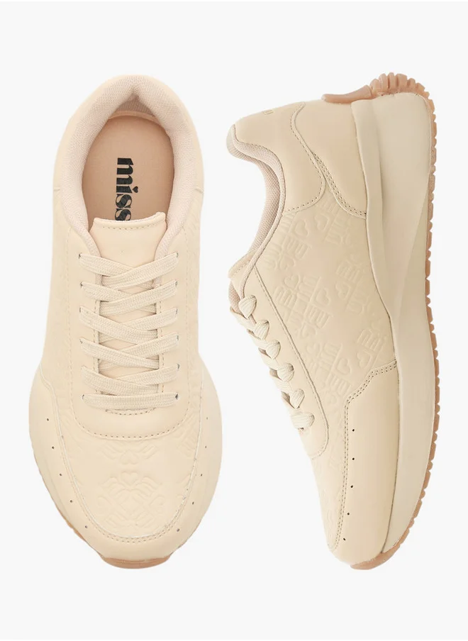 MISSY Monogram Embossed Lace-Up Sneakers