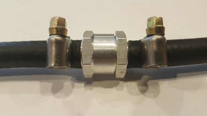 Muzzys صمام فحص الوقود Muzzys 8mm، 5/16"، خطي، باتجاه واحد، غير قابل للعودة، من الألمنيوم، مع مشابك، للماء، الغاز، الديزل، والزيوت، على UTV، كواد، سكوتر ثلجي، دراجة نارية، جت سكي، جزازة، منفاخ، سيارة، شاحنة، جرار - Image 4