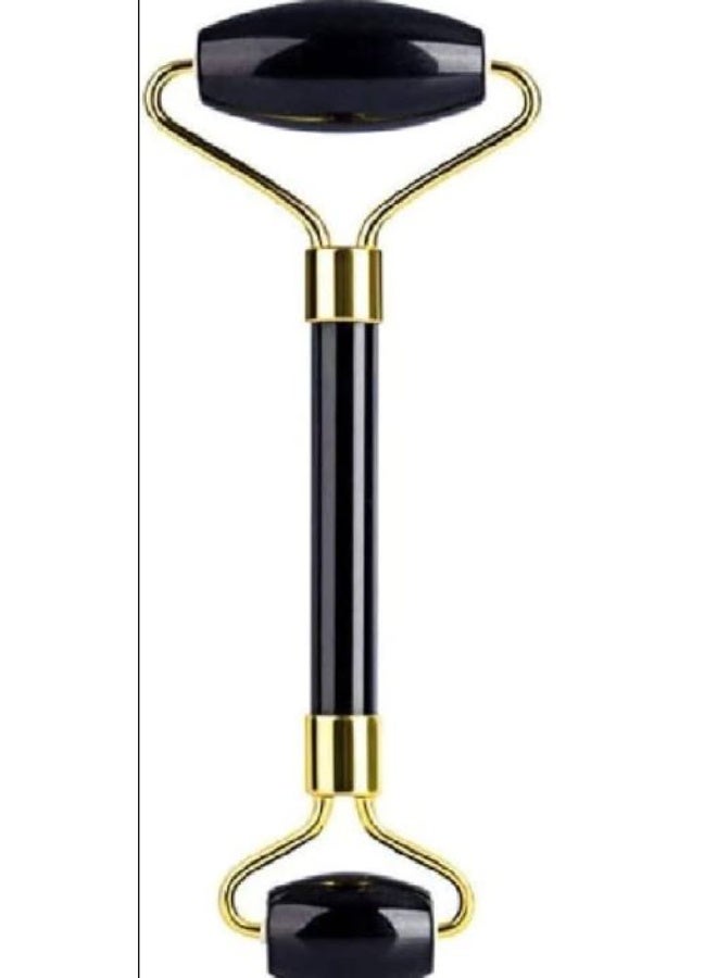 This black double-sided facial massage roller massages and firms the face and neck, reduces puffiness and dark circles, and smooths skin contours. It stimulates collagen production and features a luxurious design with a comfortable grip and double rolling surface for a relaxing and daily skincare experience. - Image 5