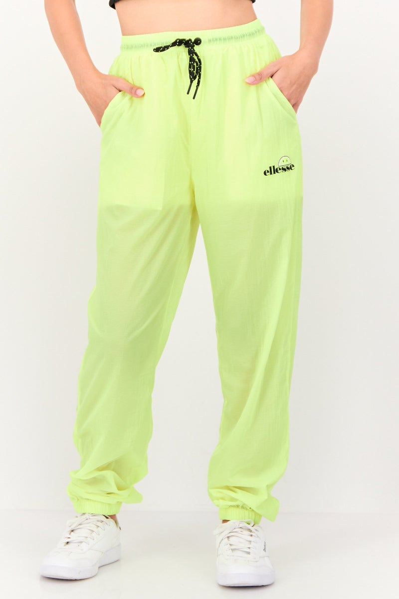 Ellesse بنطلونات تدريب رياضية للنساء من إليس x سمايلي بشعار العلامة التجارية، أصفر نيون - Image 1