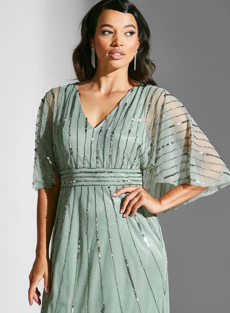 Namshi x Dana Cape Detail Embellished Dress for Women | Best Price UAE Namshi x Dana Cape Detail Embellished Dress for Women | Best Price UAE