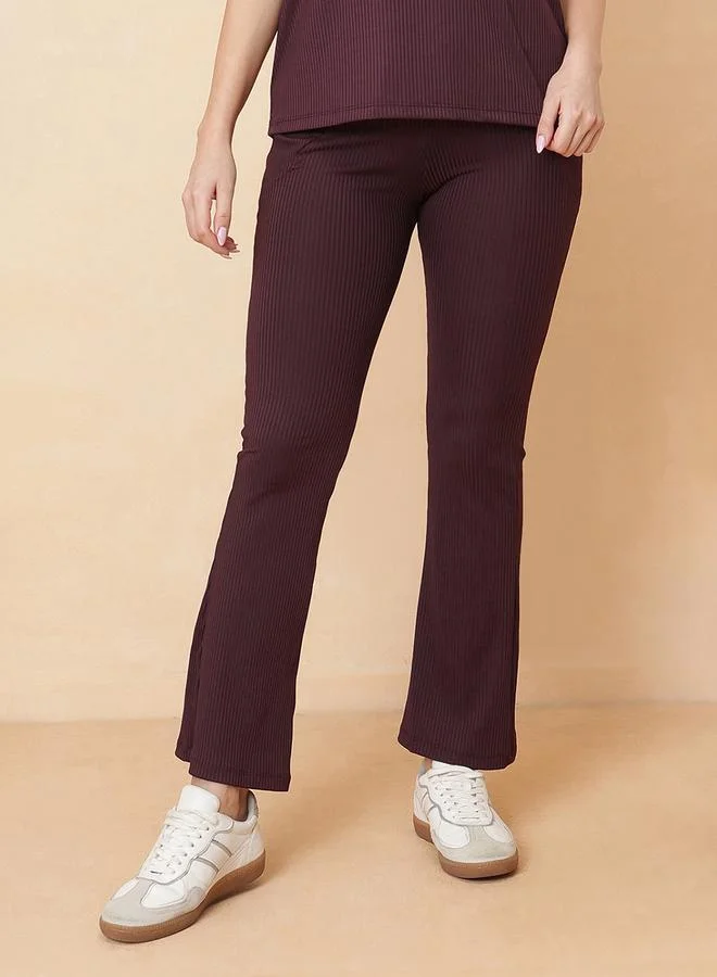 Clovia Brown Ribbed Flared Active Pants with Pockets