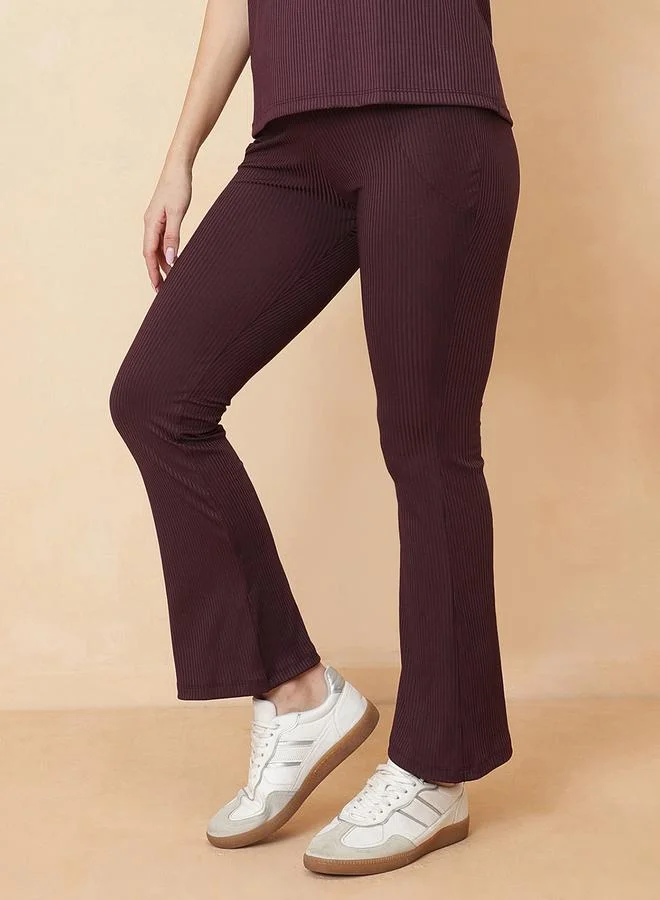 Clovia Brown Ribbed Flared Active Pants with Pockets