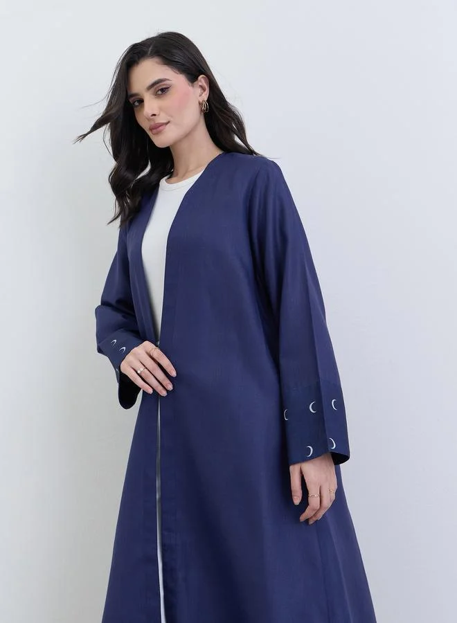 أميرة عباية كتان بتفاصيل مطبوعة على الأساور