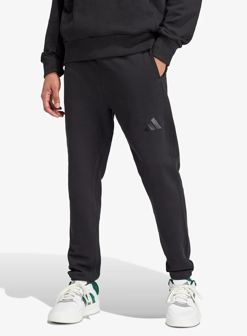 اديداس بنطلون رياضي بقصة مستقيمة من قماش التيري الفرنسي لجميع المواسم