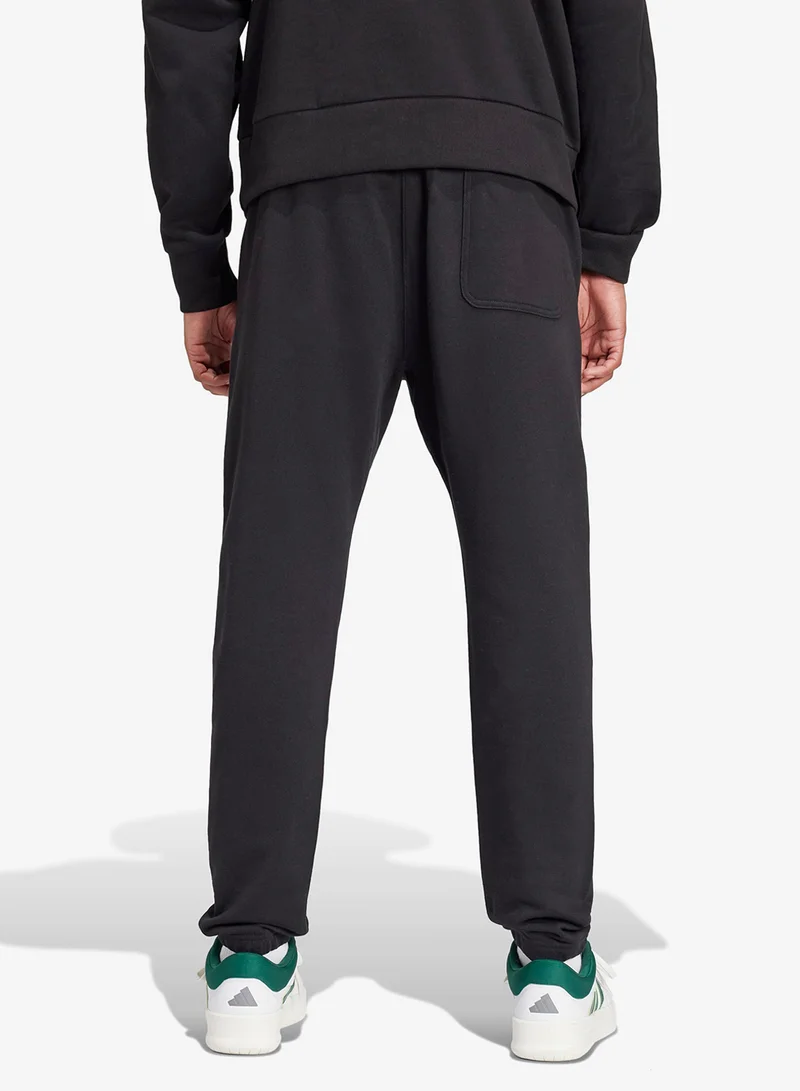 اديداس بنطلون رياضي بقصة مستقيمة من قماش التيري الفرنسي لجميع المواسم