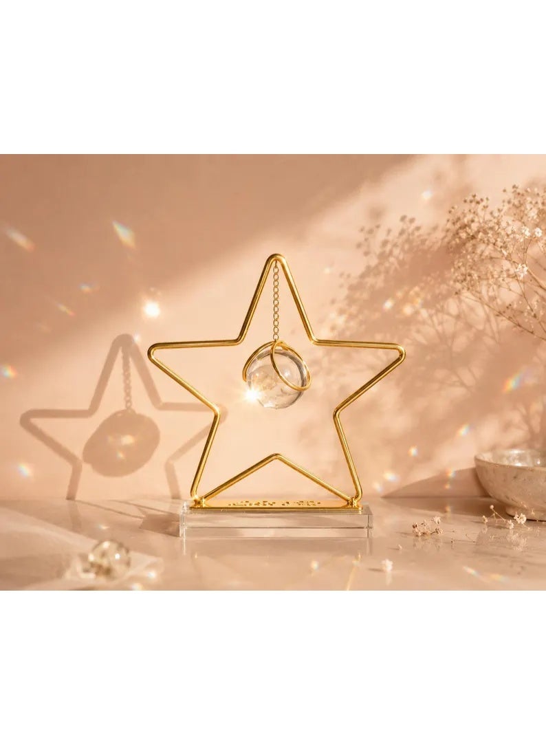 A stunning gold metal star-shaped decorative piece with a hanging crystal ball and transparent base - a modern and elegant decoration for tables and bookshelves - Image 2