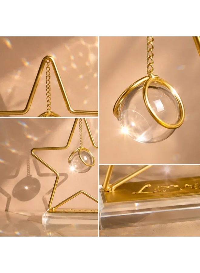 A stunning gold metal star-shaped decorative piece with a hanging crystal ball and transparent base - a modern and elegant decoration for tables and bookshelves - Image 1