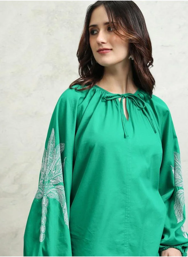 Tokyo Talkies Floral Print Balloon Sleeve Top with Tie-Up Neck by Styli