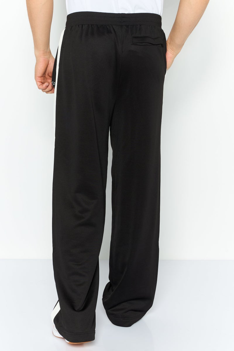 PUMA Men Relaxed Fit Outdoor Sweatpants, Black - Image 4