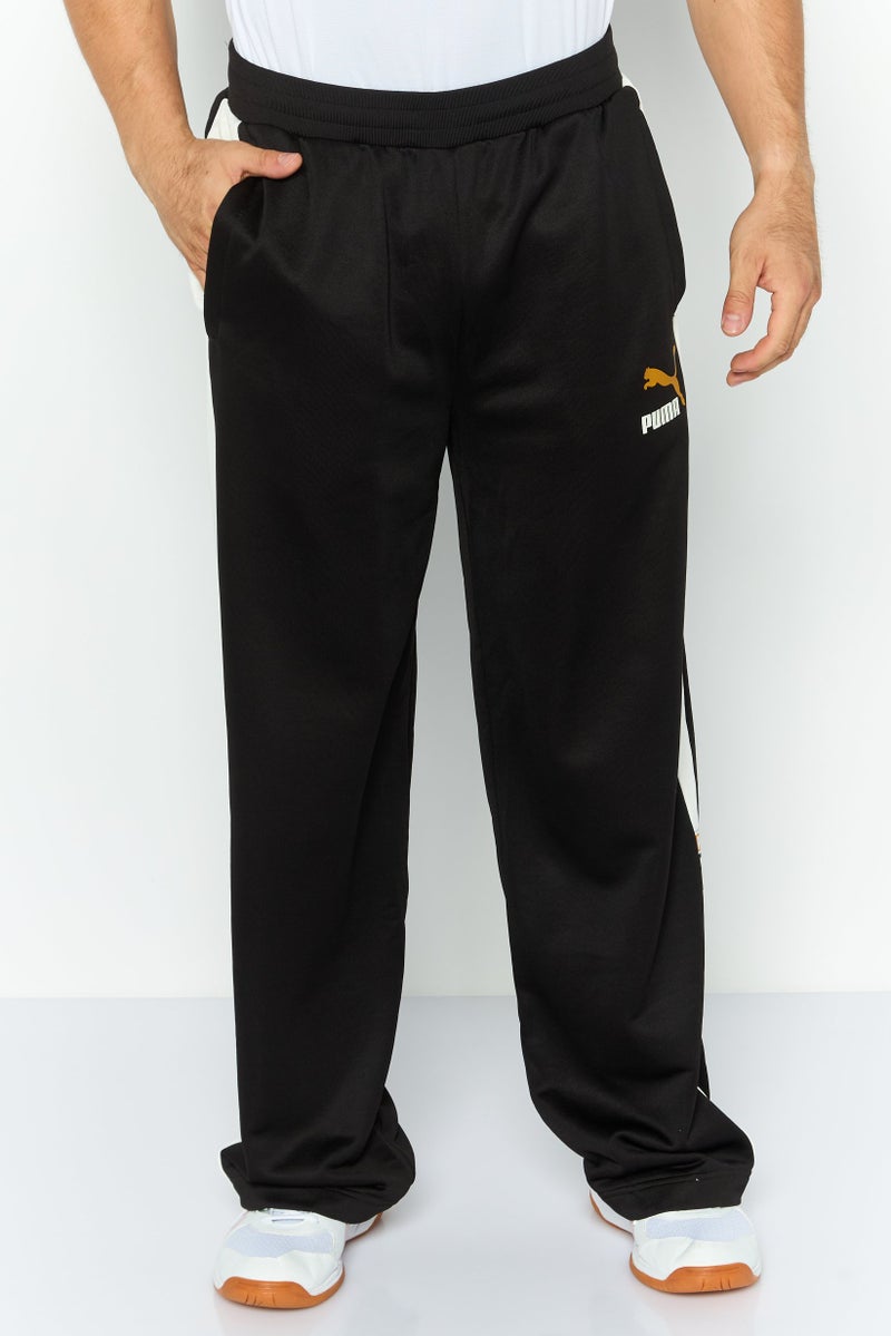 PUMA Men Relaxed Fit Outdoor Sweatpants, Black - Image 1