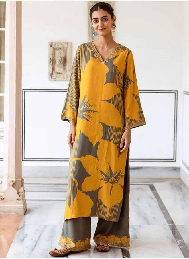 آي شين Mid Rise Women Mustard Rayon Kurta Set with Embroidered pattern Tunic and Palazzo features a Round neckline and Three-Fourth Sleeve secured with Elastic closure and styled in Straight Fit ideal for Festive moments — crafted to elevate your special moments.