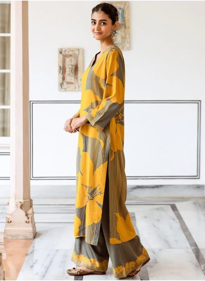 آي شين Mid Rise Women Mustard Rayon Kurta Set with Embroidered pattern Tunic and Palazzo features a Round neckline and Three-Fourth Sleeve secured with Elastic closure and styled in Straight Fit ideal for Festive moments — crafted to elevate your special moments.