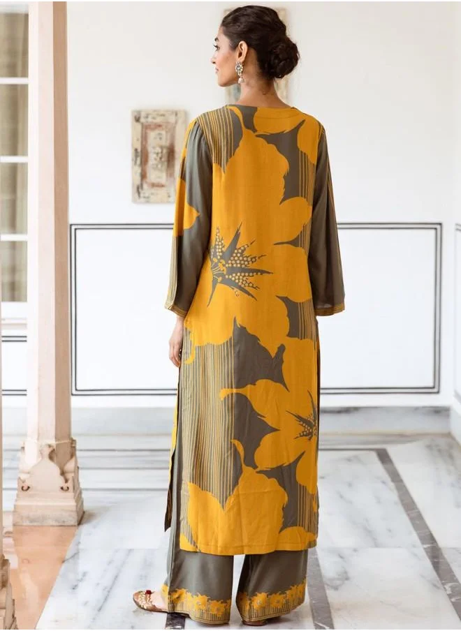 آي شين Mid Rise Women Mustard Rayon Kurta Set with Embroidered pattern Tunic and Palazzo features a Round neckline and Three-Fourth Sleeve secured with Elastic closure and styled in Straight Fit ideal for Festive moments — crafted to elevate your special moments.