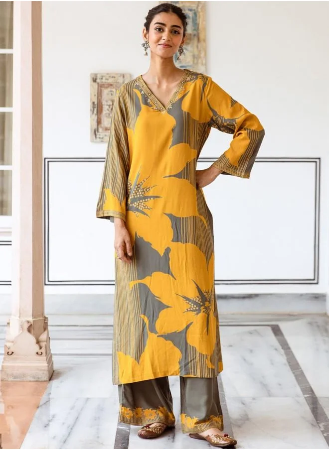 ISHIN Mid Rise Women Mustard Rayon Kurta Set with Embroidered pattern Tunic and Palazzo features a Round neckline and Three-Fourth Sleeve secured with Elastic closure and styled in Straight Fit ideal for Festive moments — crafted to elevate your special moments.
