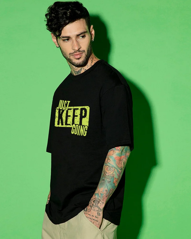 bewakoof Men's Jet Black Just Keep Going Typography Oversized T-shirt