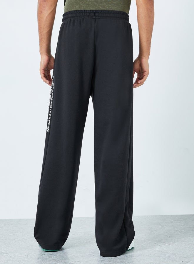 Styli Men Black Minimal Print Relaxed Fit Joggers - Image 3