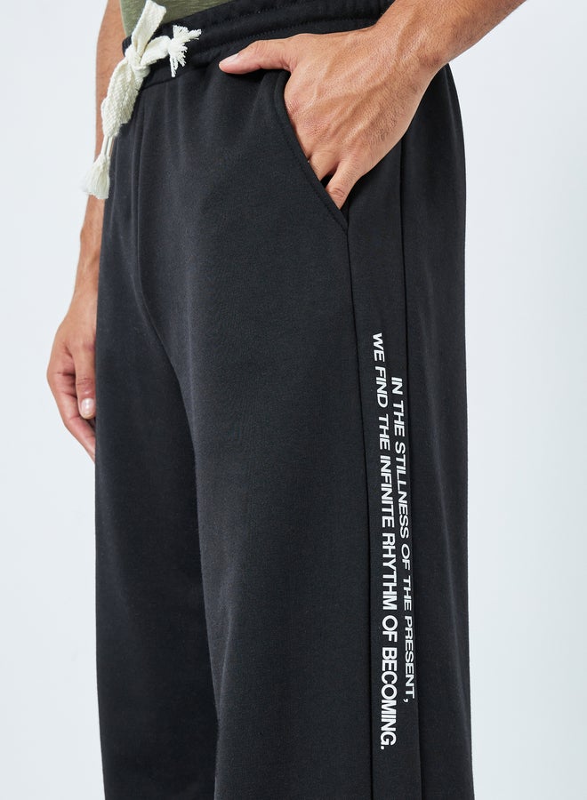 Styli Men Black Minimal Print Relaxed Fit Joggers - Image 4