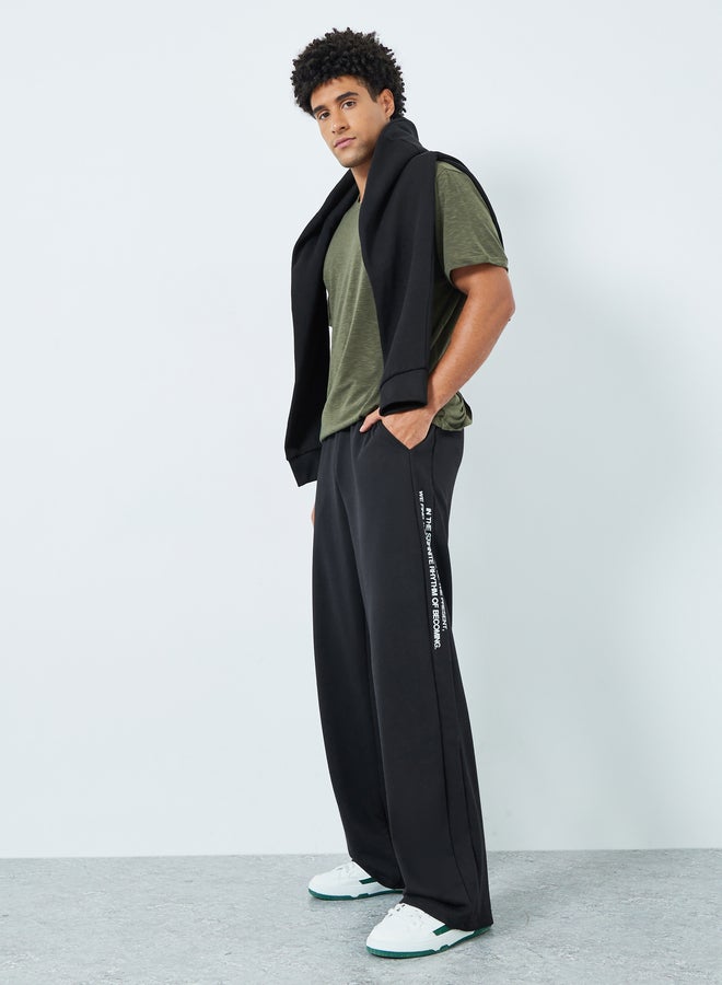 Styli Men Black Minimal Print Relaxed Fit Joggers - Image 2