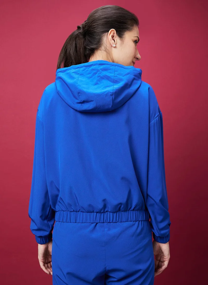 جلو باص جاكيت بومبر نسائي بطباعة جرافيك وشريط عاكس من جلوبس