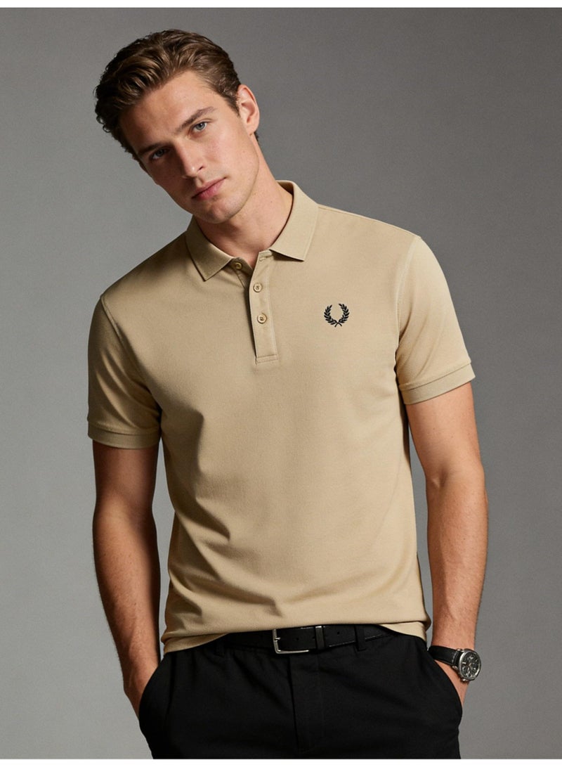Fred Perry  double-pointed Polo shirt | Men's Polo shirt with white striped collar and cuffs, classic modern style, creating timeless casual fashion. - Image 1