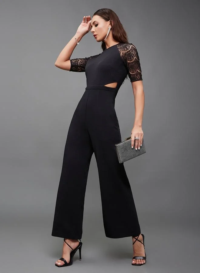Styli Lace Insert Round Neck Wide Leg Jumpsuit with Cut-Out Detail
