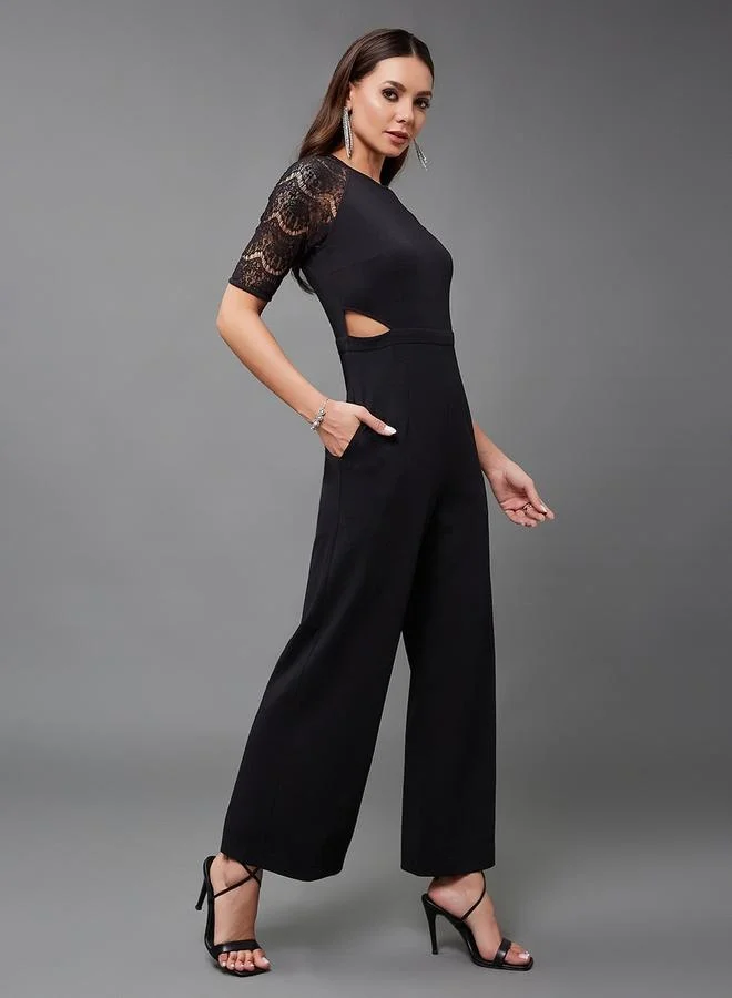 Styli Lace Insert Round Neck Wide Leg Jumpsuit with Cut-Out Detail