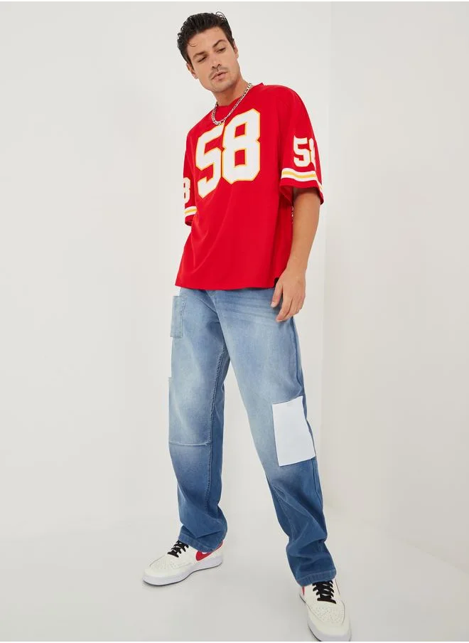 Styli Styli Varsity Print Mesh Knit Oversized T-shirt