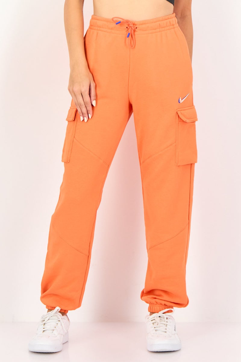 Nike Women Sportswear Fit Outdoor Sweatpants, Orange - Image 1