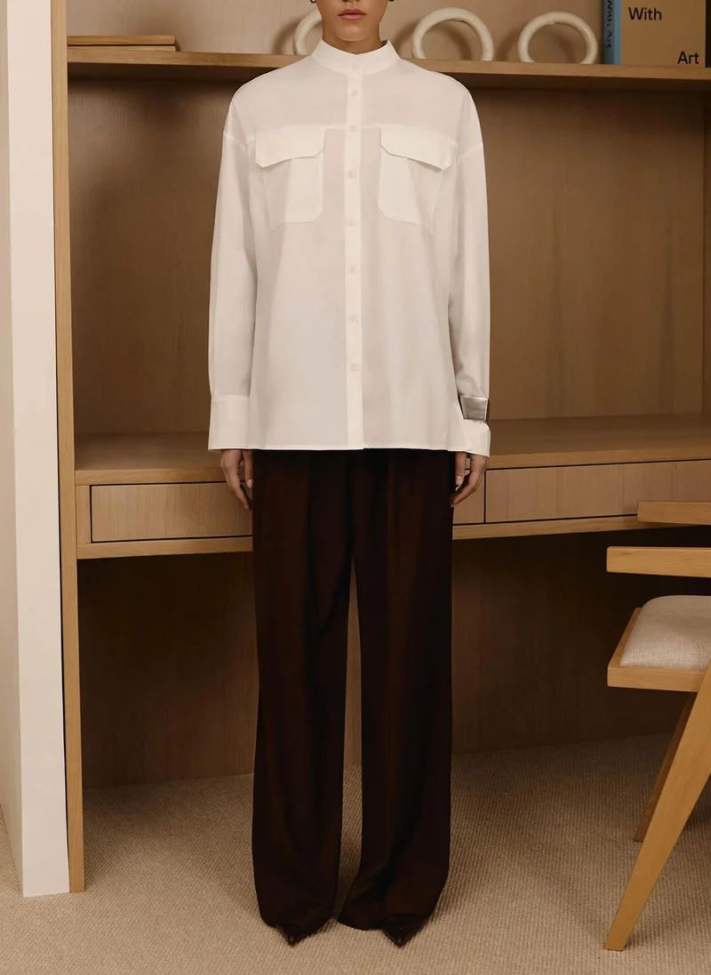 Lichi Loose trousers with waist pleats and eco-leather belt