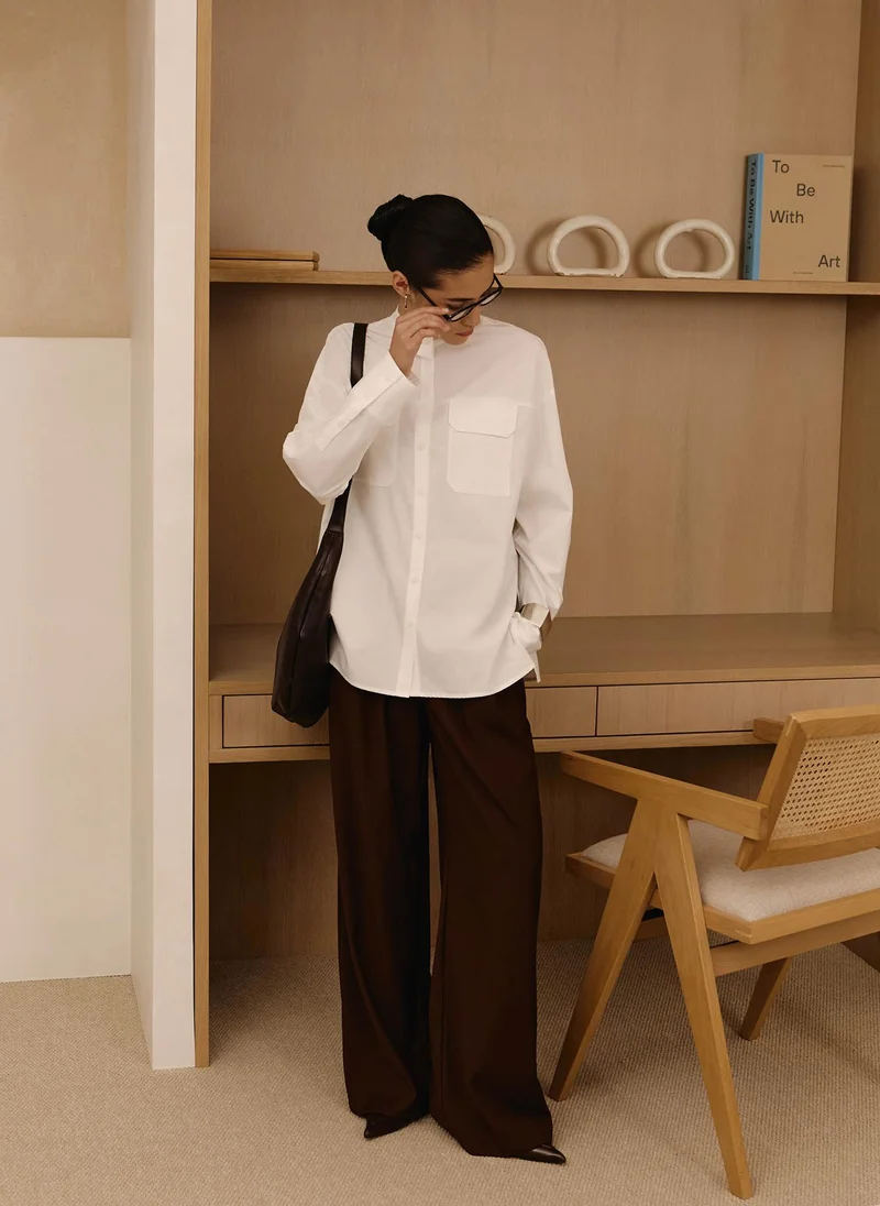 Lichi Loose trousers with waist pleats and eco-leather belt