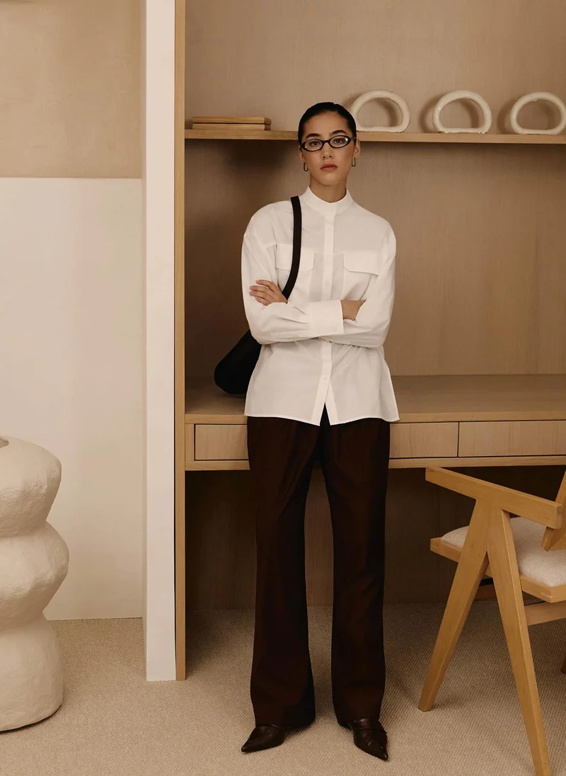 Lichi Loose trousers with waist pleats and eco-leather belt