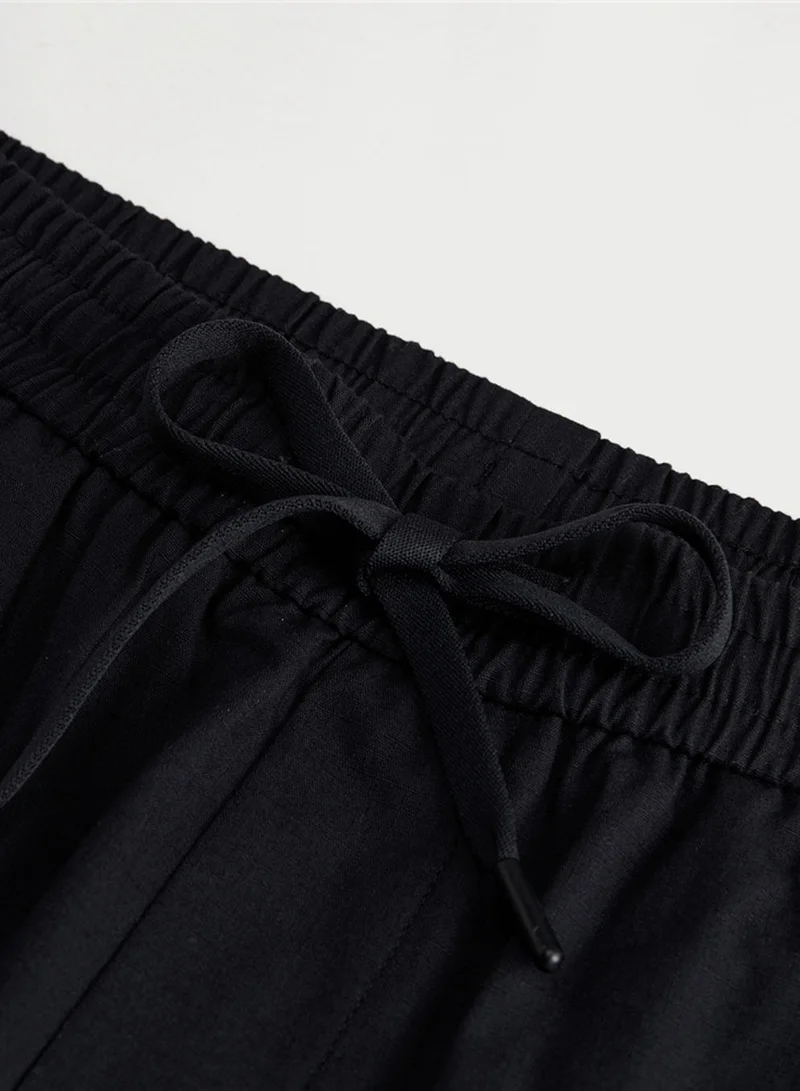 GIORDANO  Men’s Regular Fit Ripstop Crop Pants for Men | Best Price UAE