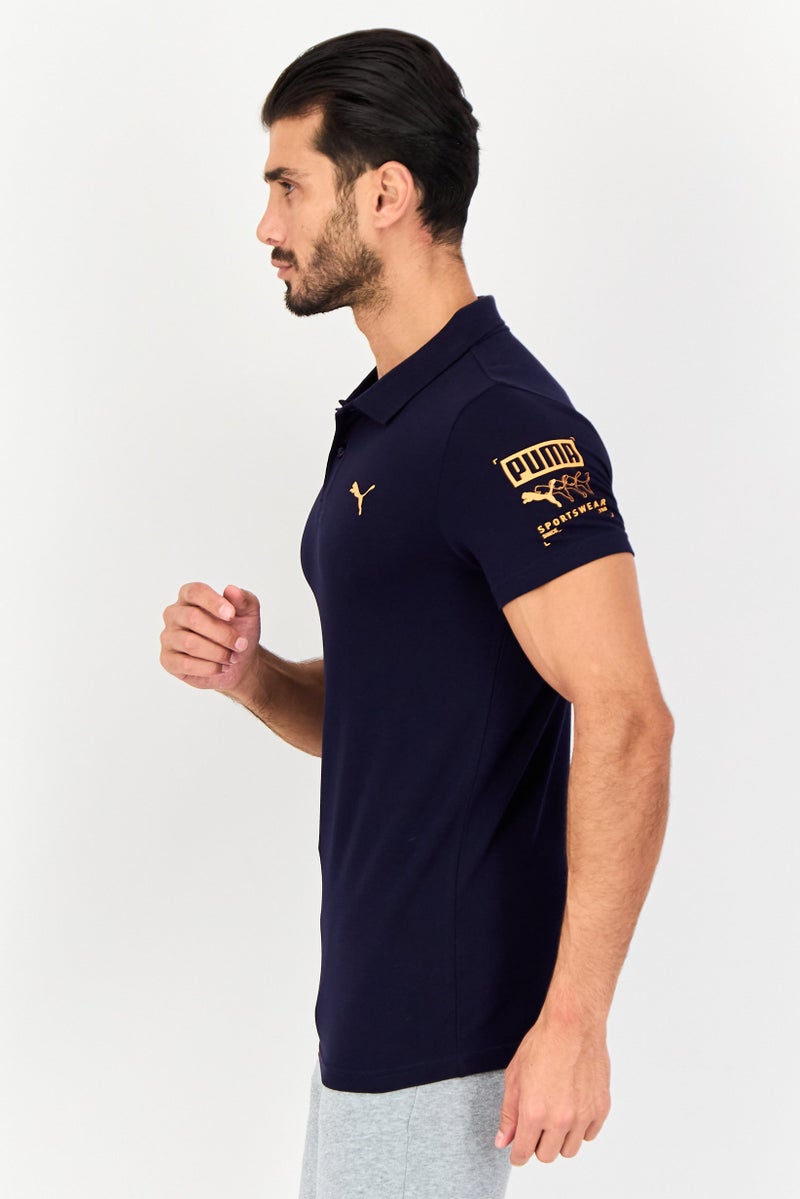 PUMA قميص بولو قصير الأكمام للرجال بتصميم ضيق مع شعار العلامة التجارية، أزرق داكن - Image 3