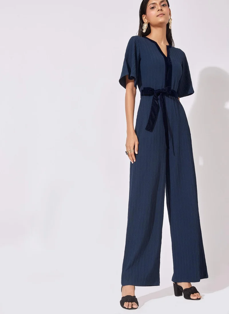 The Label Life Front Tie Flared Jumpsuit