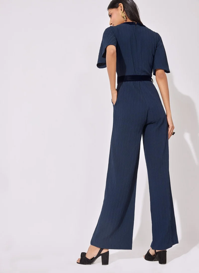 The Label Life Front Tie Flared Jumpsuit