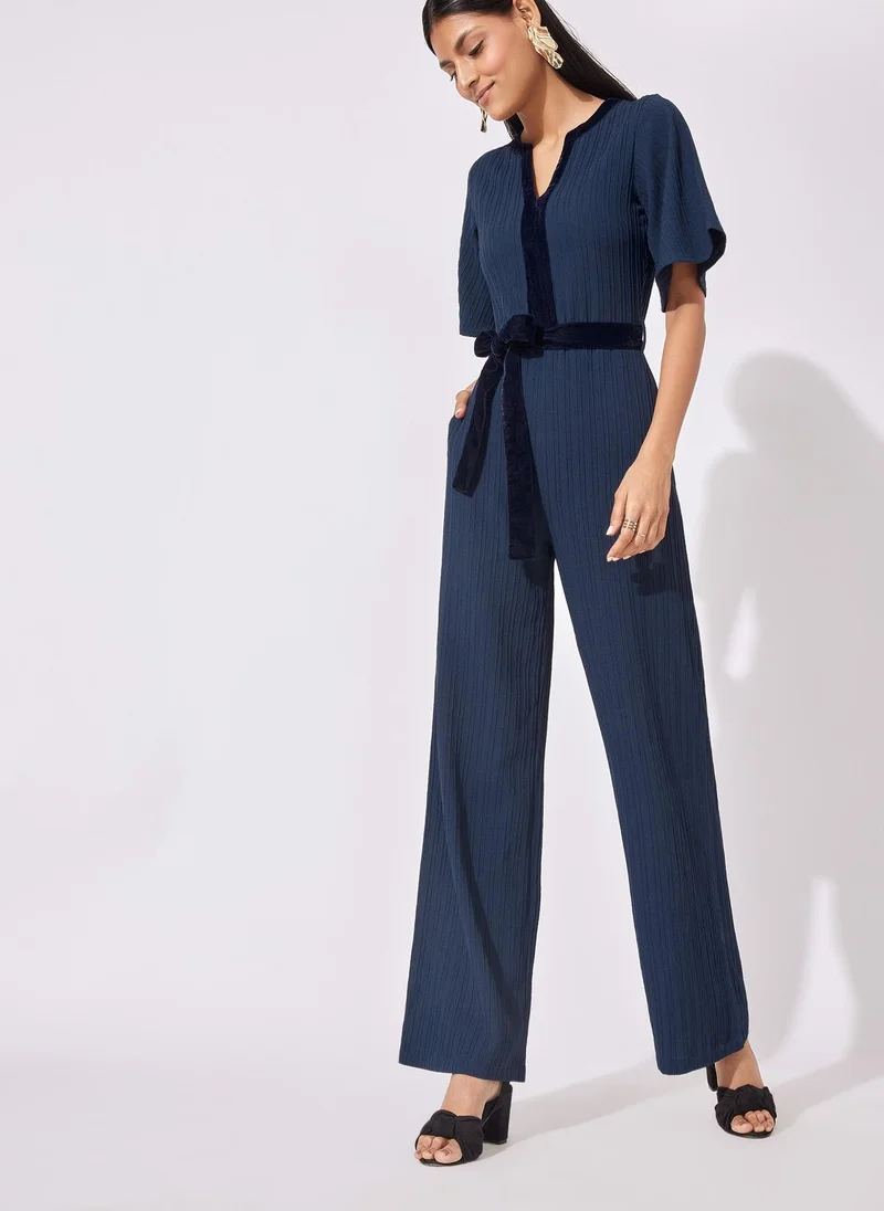 The Label Life Front Tie Flared Jumpsuit
