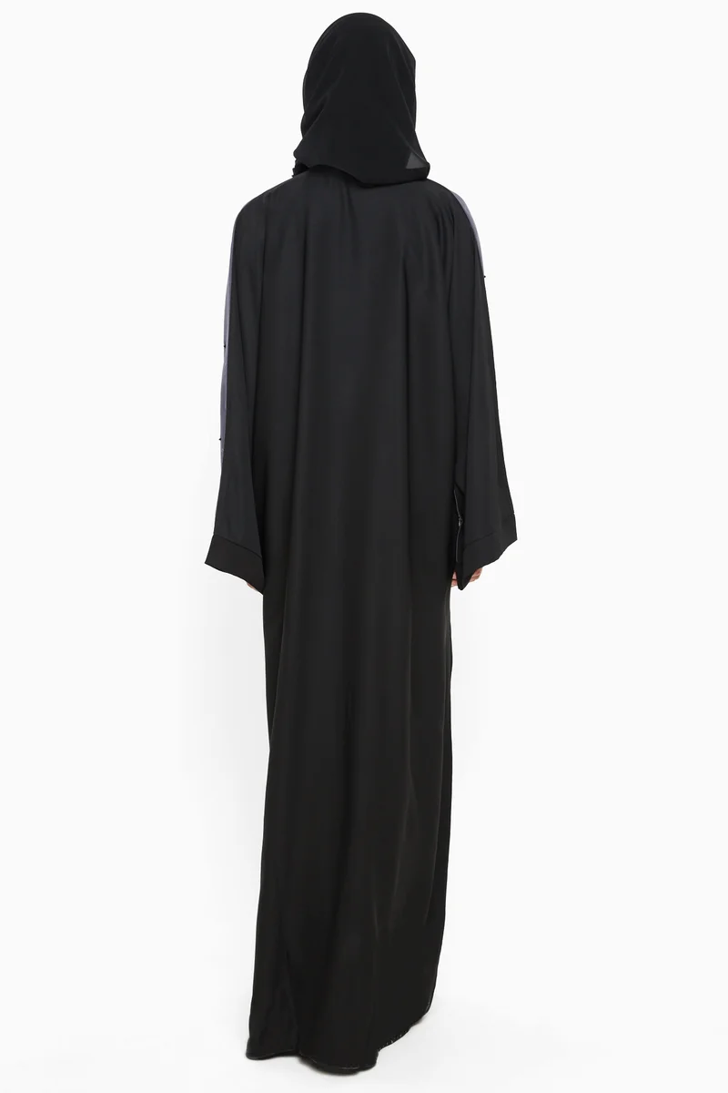 NUKHBAA A gorgeous abaya with cream crochet lace detailing studded with black pearls -AJ559A