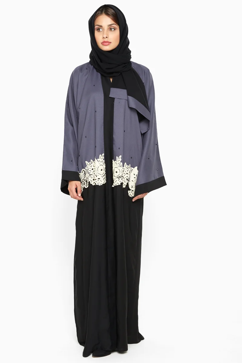 النخبة A gorgeous abaya with cream crochet lace detailing studded with black pearls -AJ559A