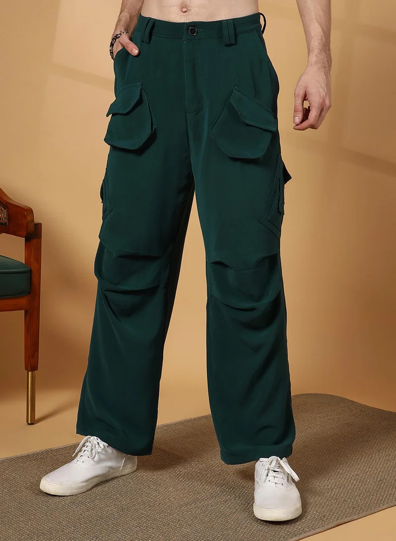 Campus Sutra Men's Emerald Green Asymmetrical Parachute Trousers For Casual Wear | 8 Pockets | Low-Rise | Button Closure | Cargo Pants Crafted With Comfort Fit For Everyday Wear