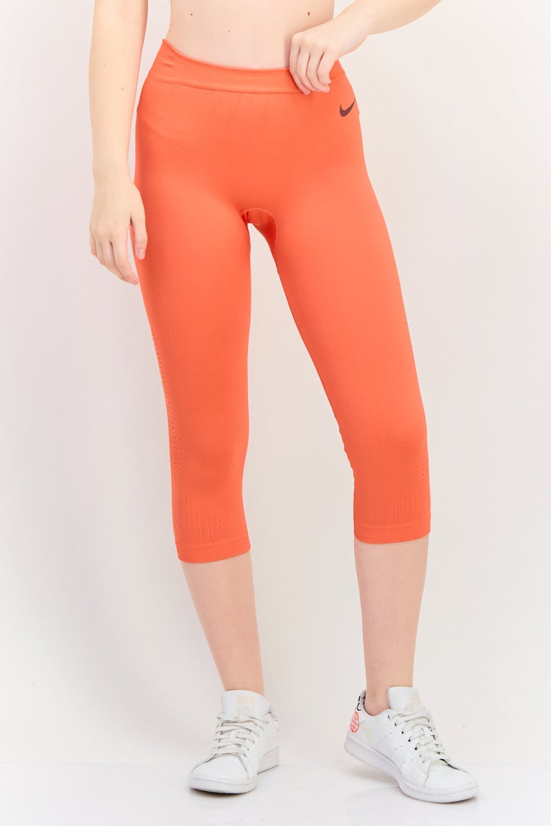 Nike Women Dri Fit Brand Logo Capri Training Tights, Orange - Image 1