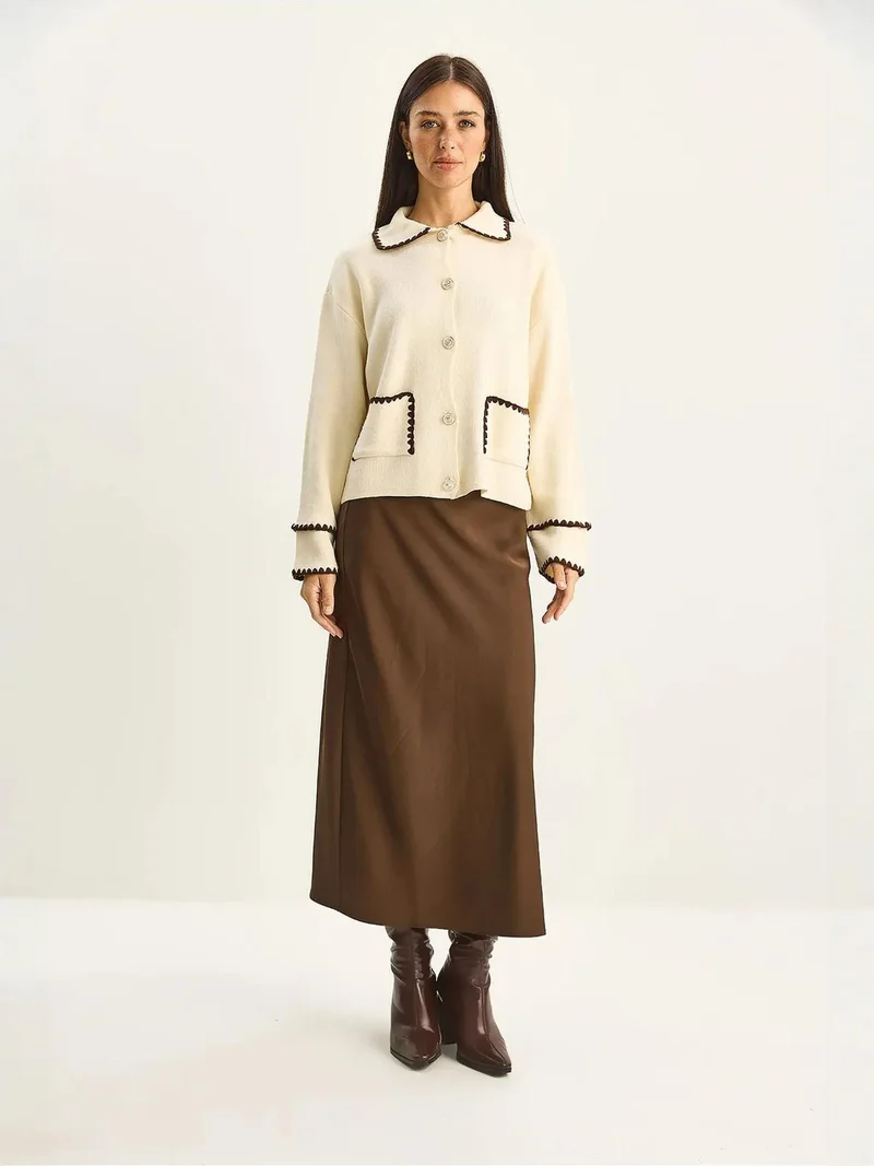 بيانكو لوتشي كارديجان بأزرار وأكمام طويلة مضلع بياقة جاكيت من لوتشي